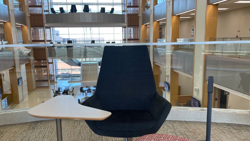 Chair and desk on one of the balconies in Hawks Hall