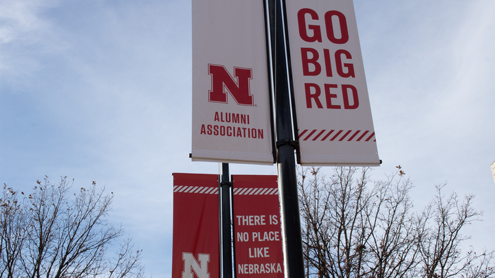 Go Big Red and There Is No Place Like Nebraska banners outside of the Alumni Center