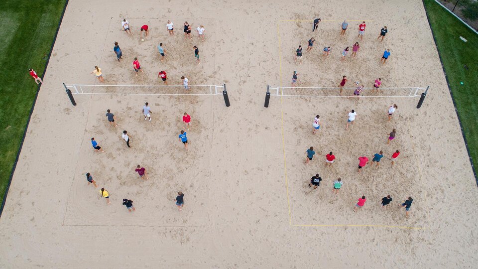 Students playing volleyball