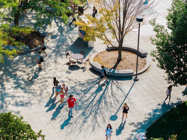 an overhead image of students walking outside the nebraska union on the union plaza
