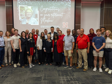 a photo of a group of attendees of marlene beyke retirement celebration at the nebraska union
