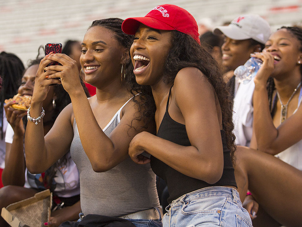 UNL students enjoying an activity in the stands of Memorial Stadium. [Craig Chandler | University Communication]