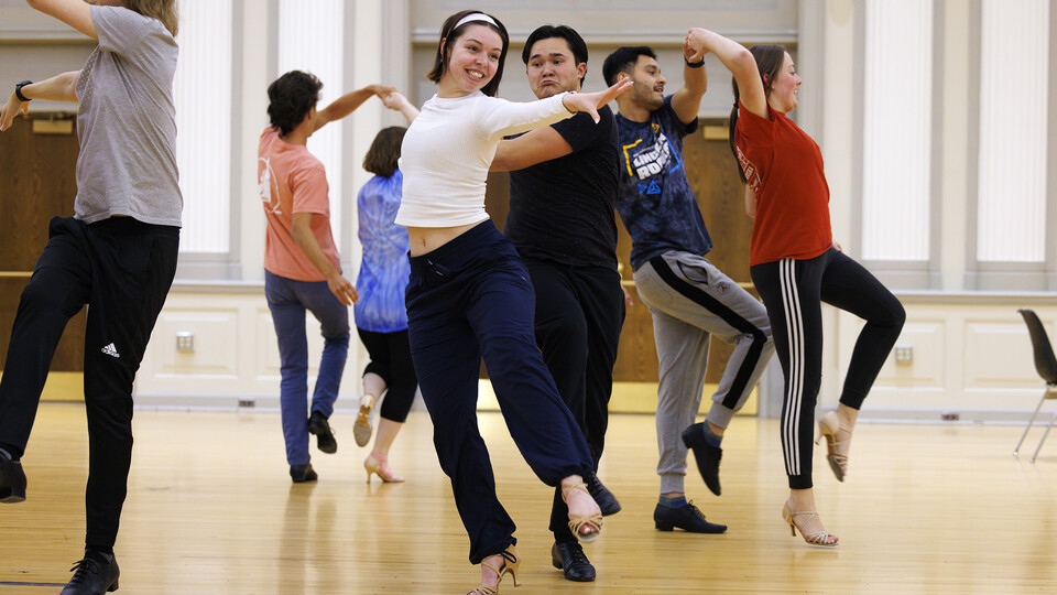 Grace Thomsen and Calen Bernbeck do a quick-step dance with the gold group. [Craig Chandler | University Communication and Marketing]