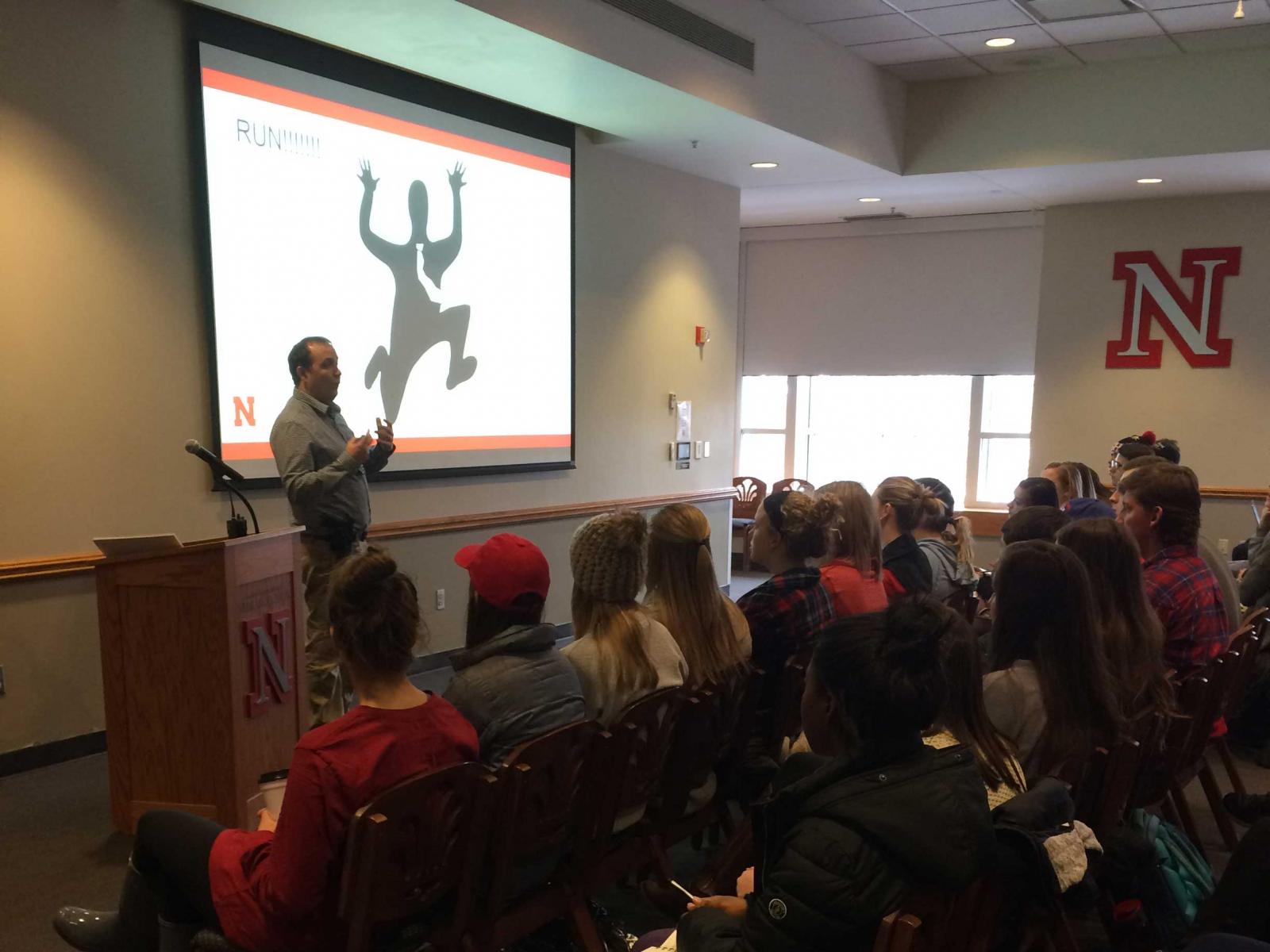 Officer Nolan Conradt presents on emergency preparedness as part of a Greek leadership symposium hosted three times per semester.