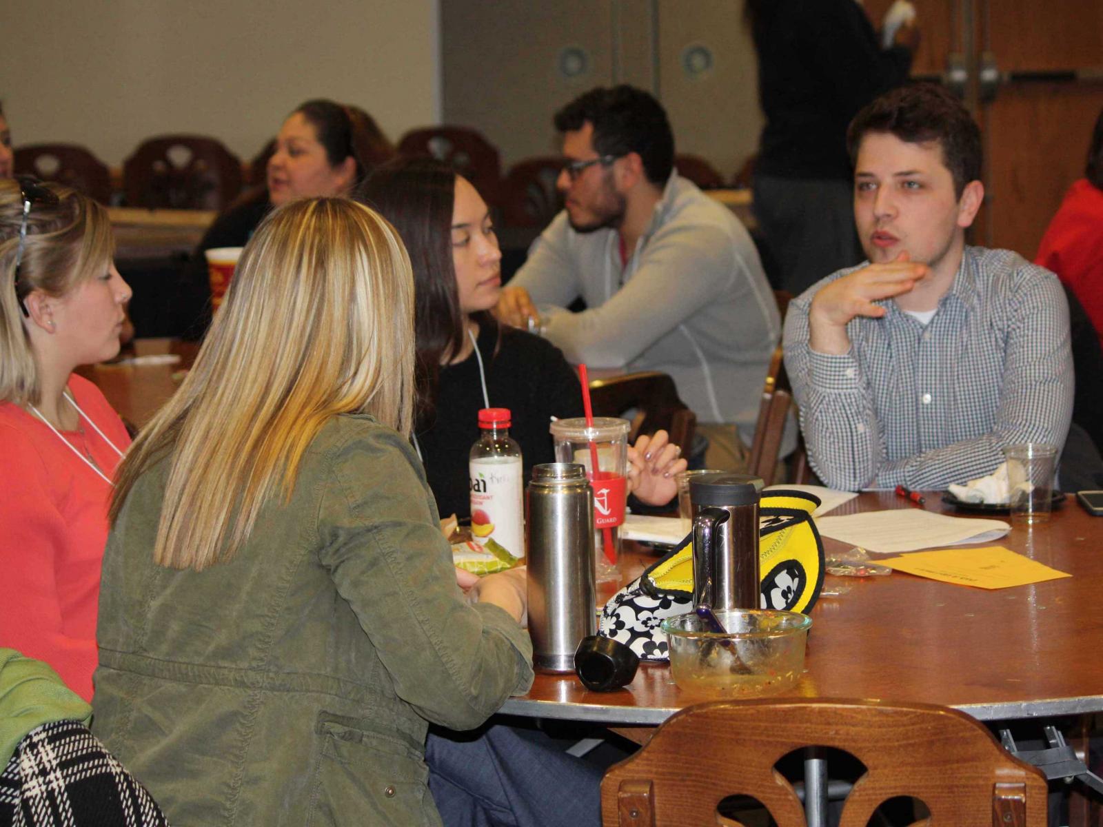 Students discuss in small groups at Our Nebraska