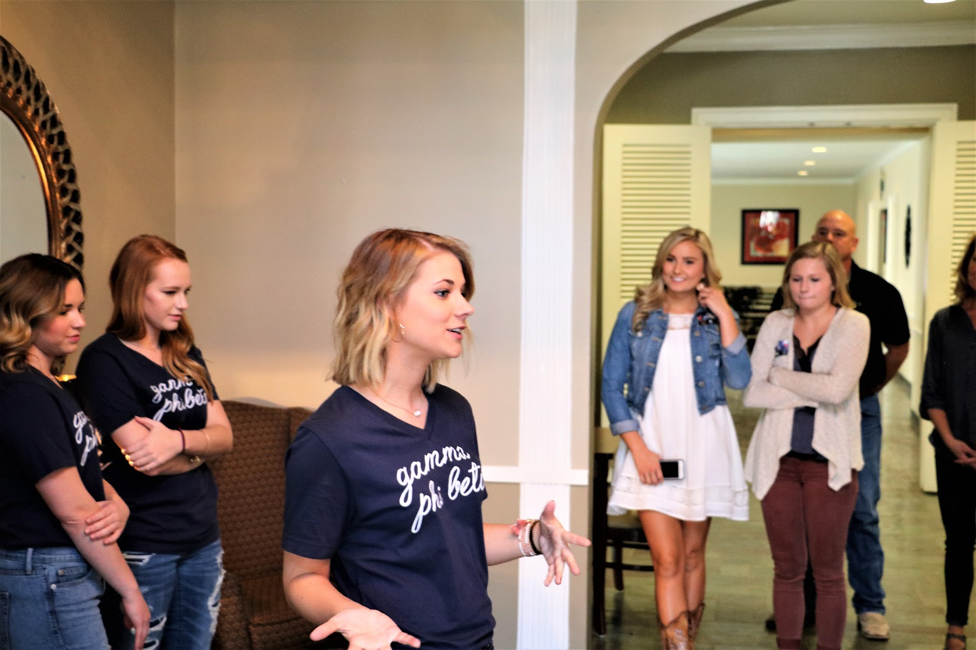 Sorority members lead house tours