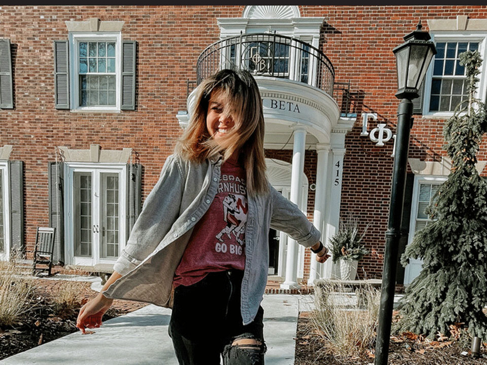 Christine Trinh outside the Gamma Phi Beta house