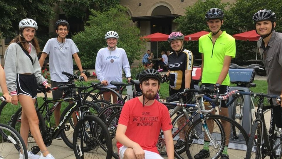 Students with bicycles outside the Dairy Store at the University of Nebraska_Lincoln.