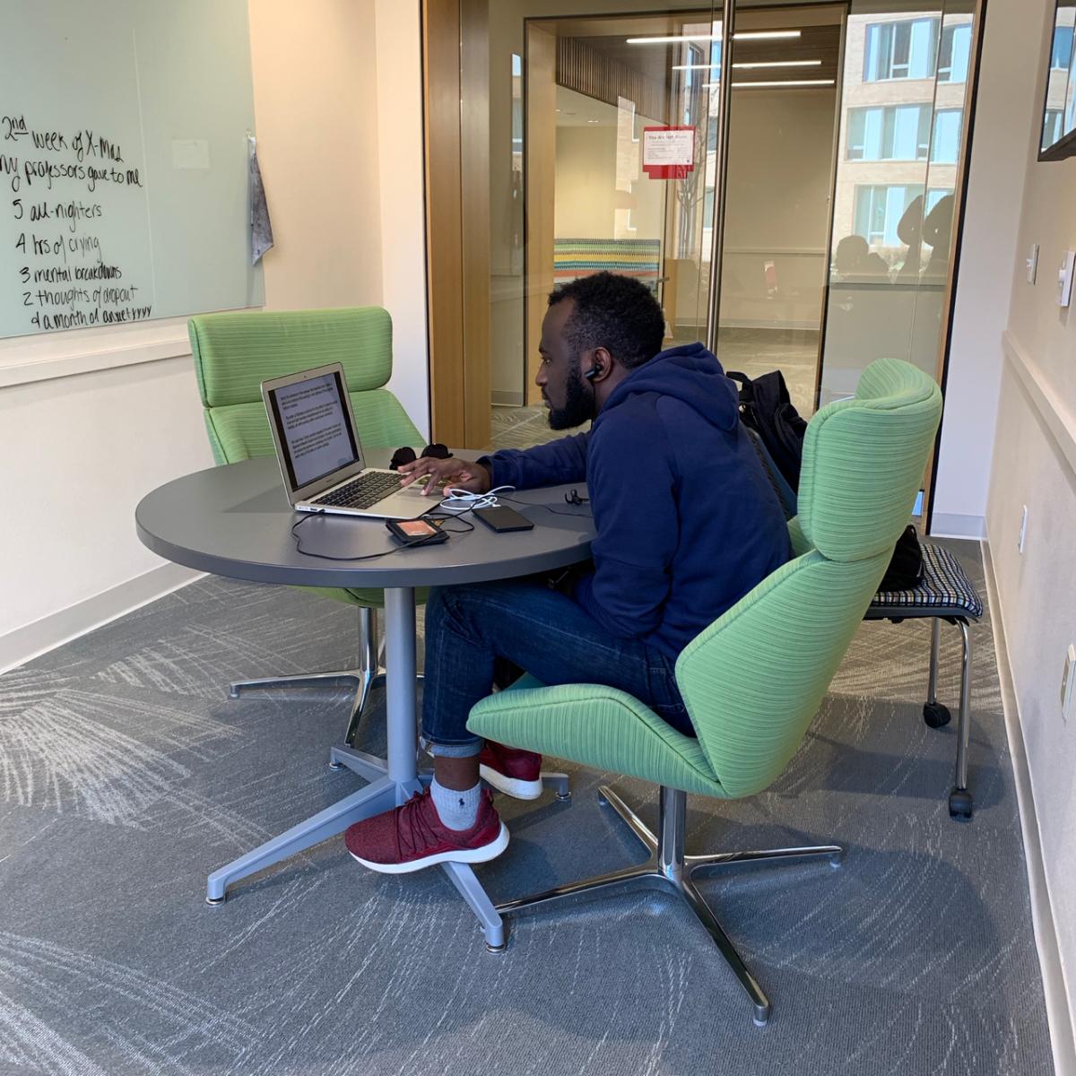 student inside a study lounge.