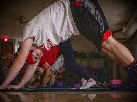 Man in downward dog position