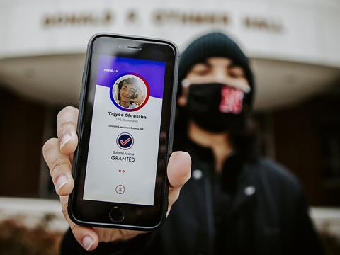 Nebraska’s Yajvoo Shrestha shows the Safer Community app to be used as part of COVID testing on campus this spring.