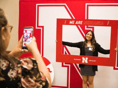 A 2022 Nebraska College Preparatory Academy graduate from Grand Island celebrates becoming a Husker during the April 27 event.