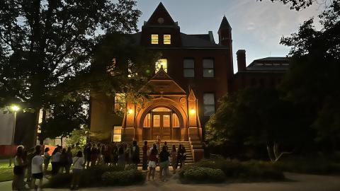 A group of students gathers at Architecture Hall to learn some of the history of the oldest building on campus. [Deann Gayman | University Communication and Marketing]