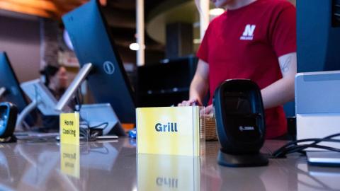 A member of staff works behind the counter at Abel Dining Hall, on Wednesday, Jan. 1, 2023, in Lincoln, Nebraska.  [Photo by Alix Robinson | Daily Nebraskan]