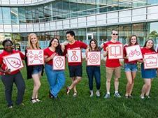 Students hold the nine dimensions of well-being