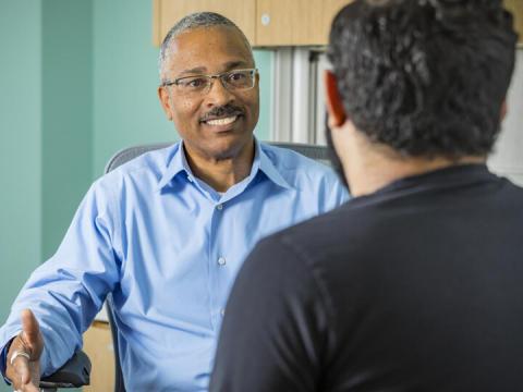 John Goldrich, a professional at CAPS, meets with a student.