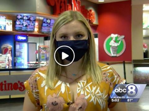 Channel 8 reporter in Nebraska Union food court.