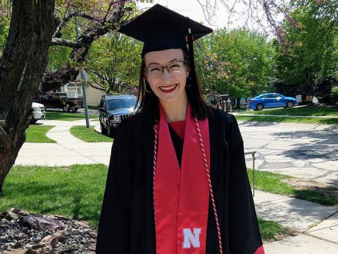 Christa Rahl in graduation cap and gown