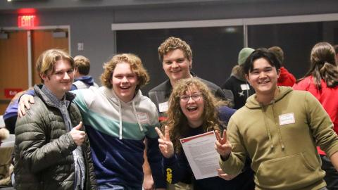 Student Resident Assistants pose for a group photo.