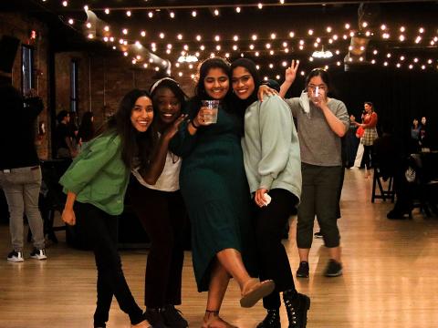 A few students smile for a photo at Life In Lincoln: Global Groove