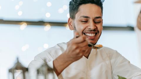 Man dining on a halal option