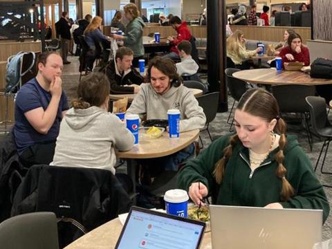 Student dine in the Selleck Food Court