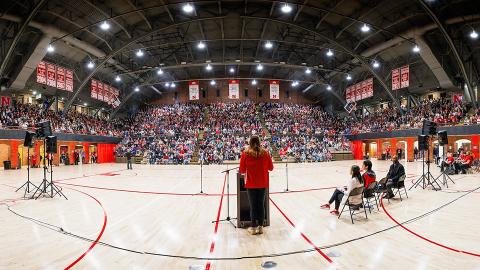 Admitted Student Day participants fill the Coliseum bleachers for a pep rally that opened the event. [Photos by Craig Chandler | University Communication and Marketing]